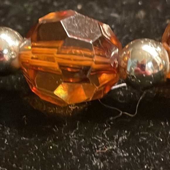 8” stackable stretch bracelet with 8 amber color & 9 silver tone beads - Picture 9 of 13